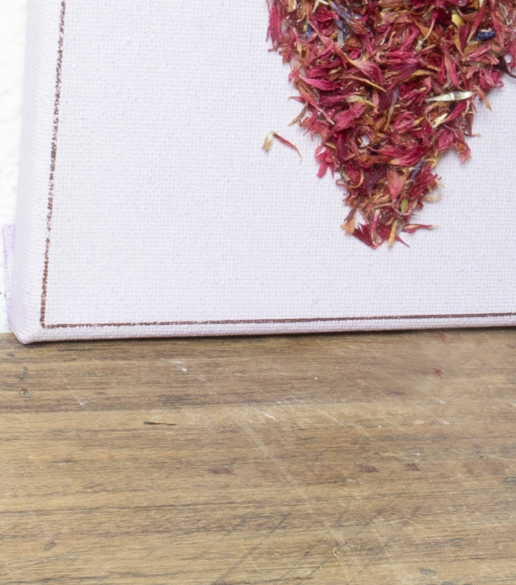 Quadro in tela con un Cuore di fiori essiccati
