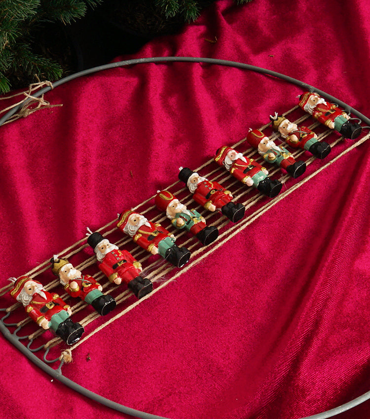 Ghirlanda Natalizia in metallo piccola con gli Schiaccianoci e spago