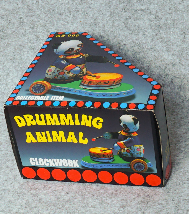 "Il Panda Batterista Vintage a Carica" in metallo