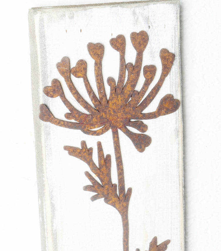 Quadretto in legno con un Soffione in corten