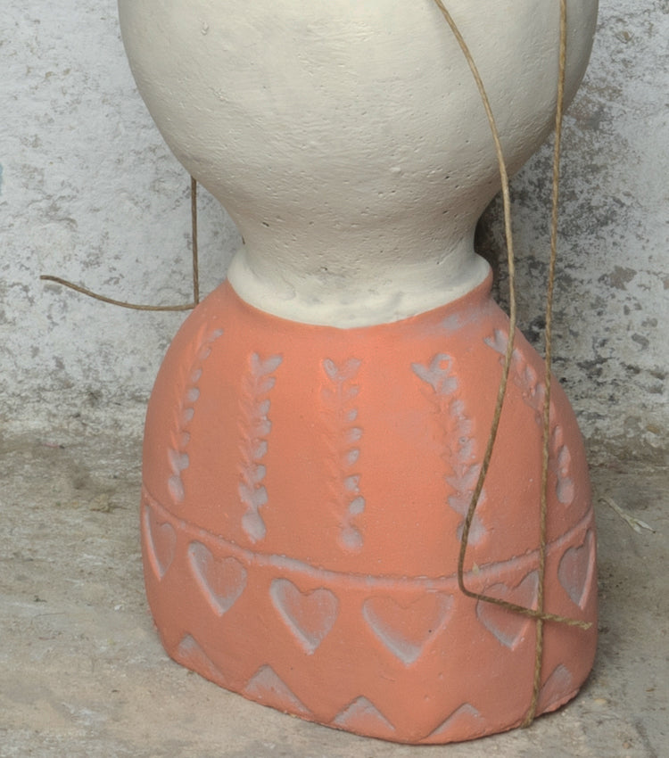 "La Candela Profumata nel Busto" in cemento con spago