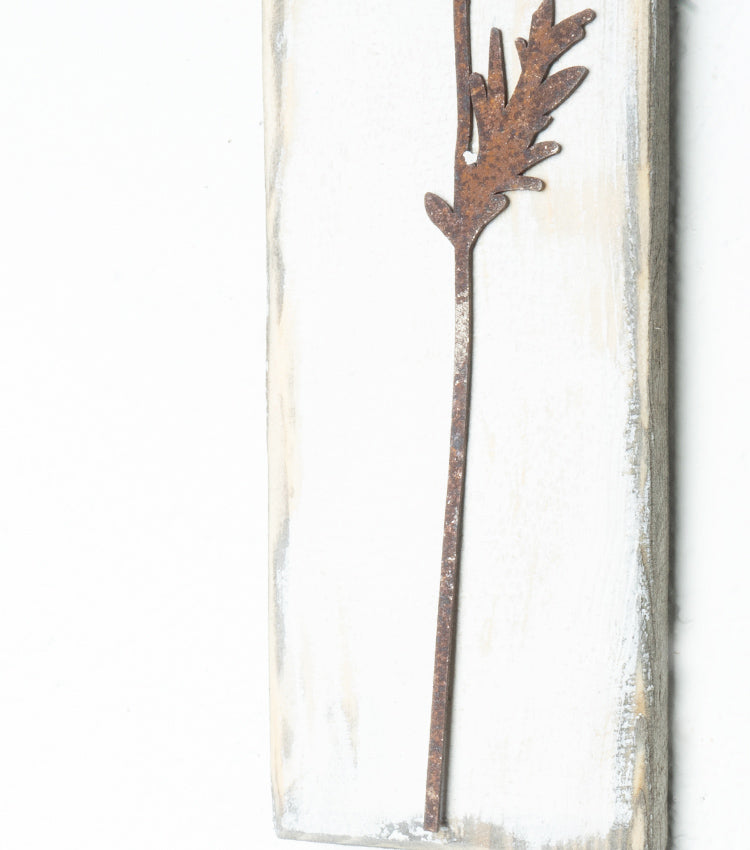 Quadretto in legno con un Soffione in corten