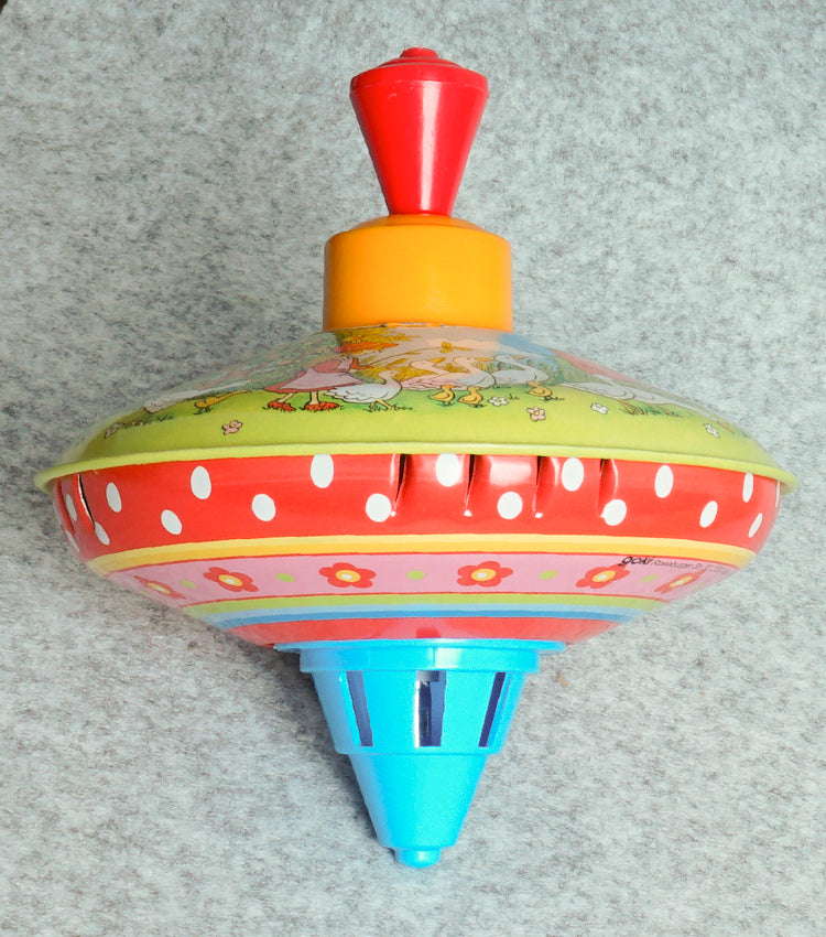 "Trottola Vintage a Carica con le Paperelle" in plastica e metallo