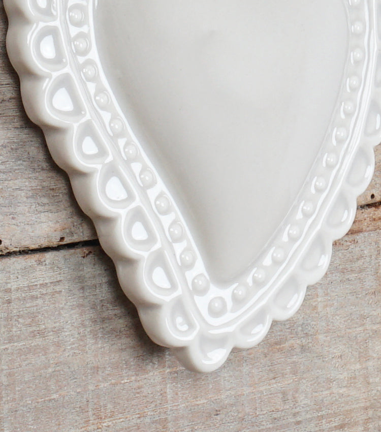 Cuore "Ex Voto" beige con la Fiamma Laccata in ceramica