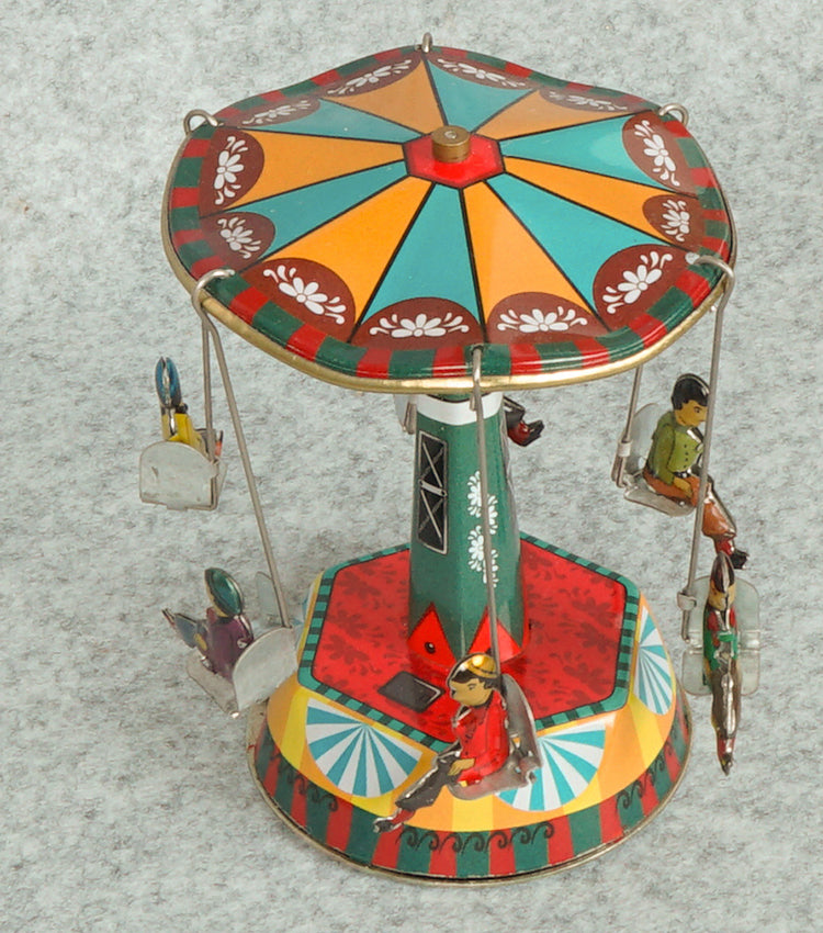"Giostrina con le Persone e Decorazioni Floreali Vintage a Carica" in metallo