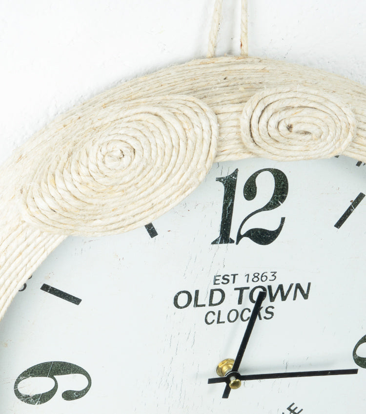 Orologio in latta rivestita con corda e decorazioni