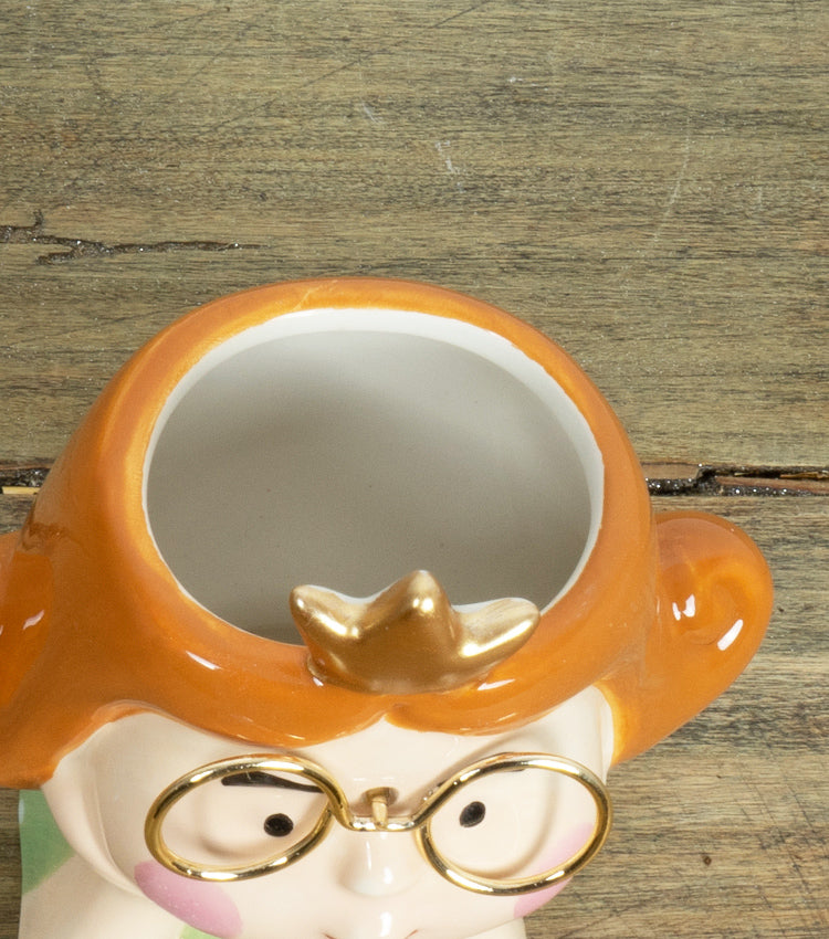 Vasetto con volto di una donna con occhiali e coroncina in ceramica e metallo