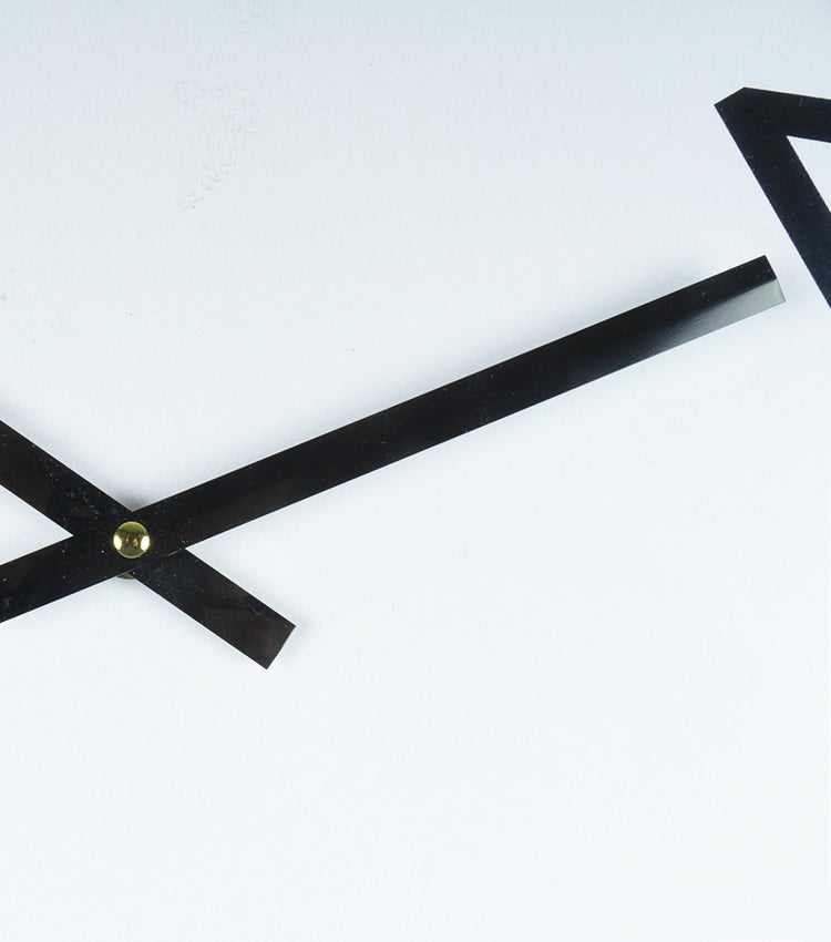 Orologio con numeri "vedo-non vedo" in metallo