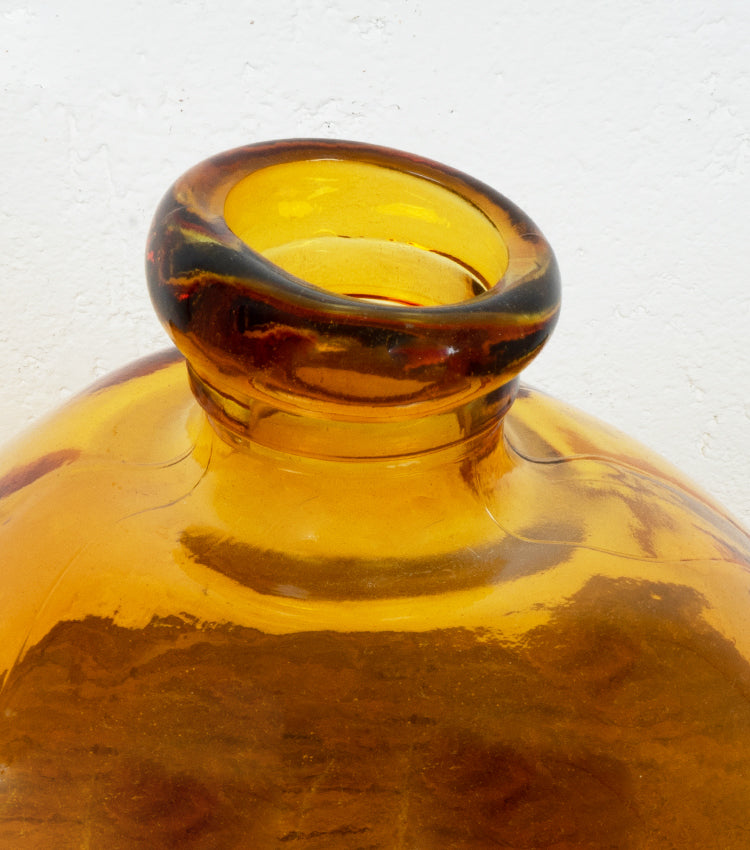 Ampolla in vetro colorato arancione, martellato e deformato
