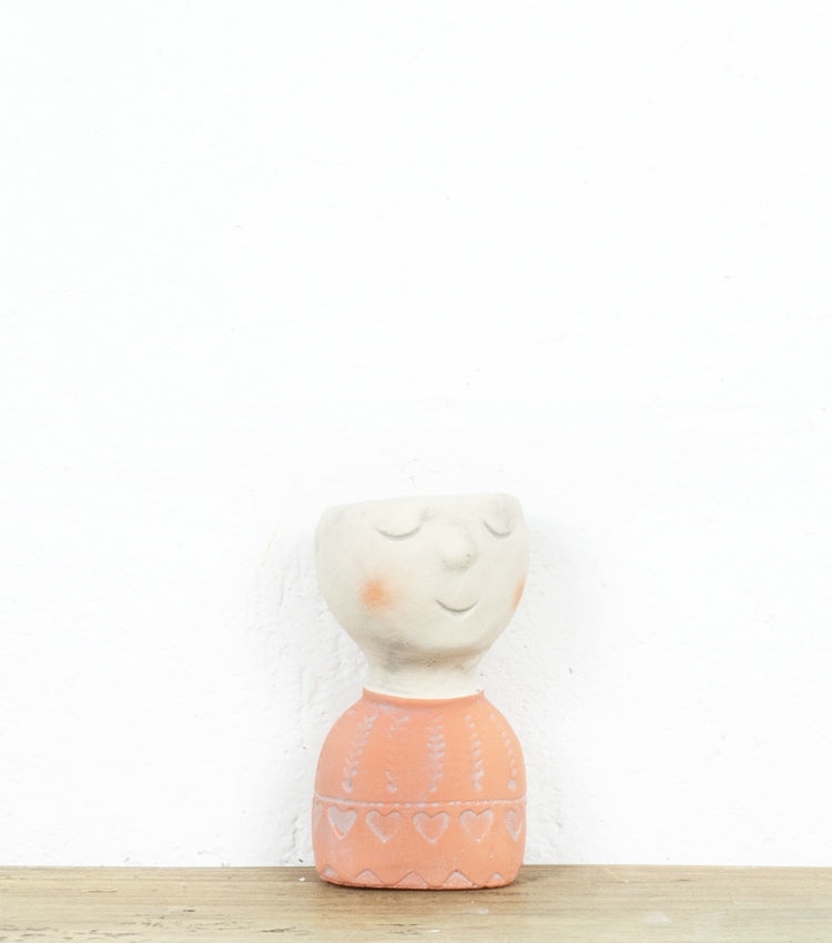 Vaso a forma di busto in cemento piccolo