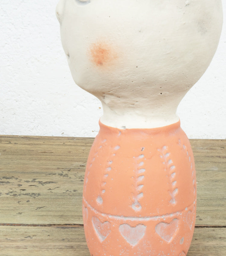 Vaso a forma di busto in cemento piccolo