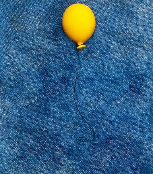 Palloncino “giallo ocra” medio in ceramica