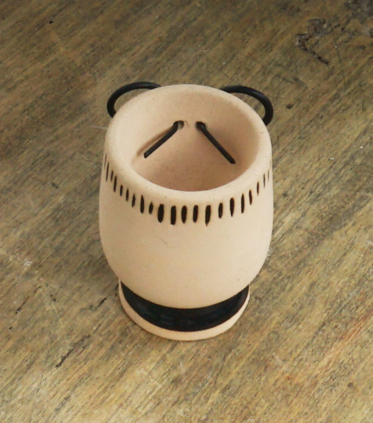 "Vasetto a forma di un Uomo con i Baffi" in cotto smaltato