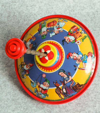 "Trottola Vintage a Carica con Biancaneve e i Sette Nani" in plastica e metallo