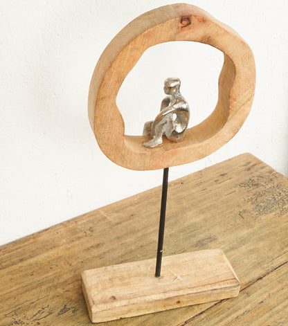 "L'Uomo nell'Orbita" in peltro e legno