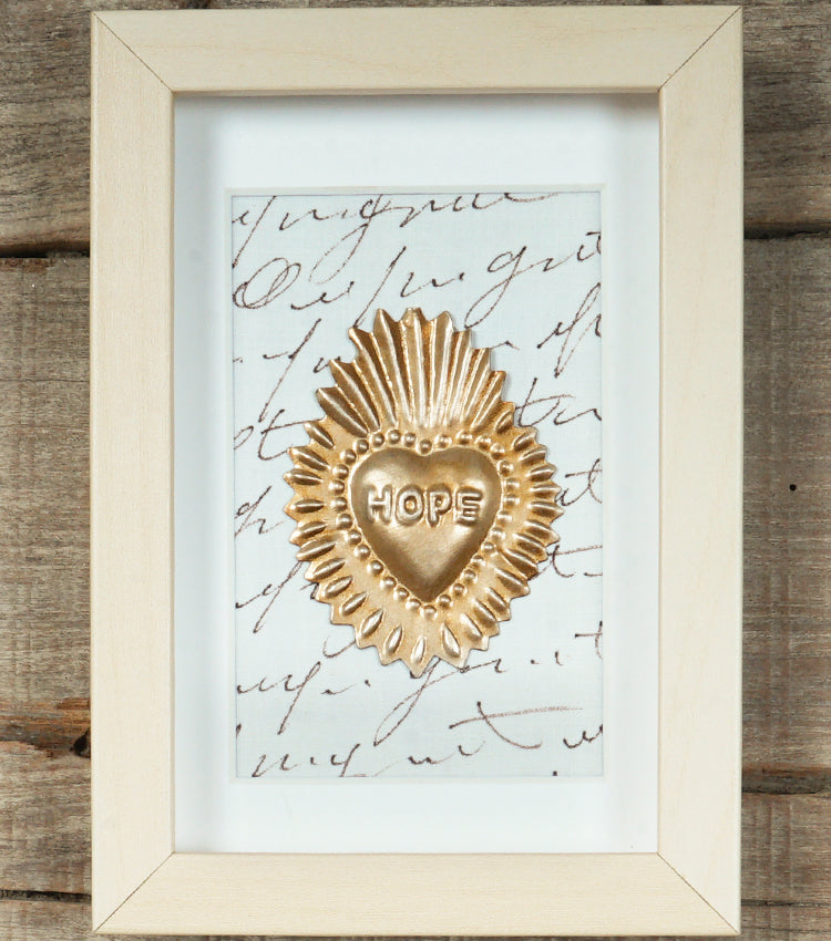 Cornice in legno con un "Cuore Ex Voto HOPE con la Fiamma" in metallo e Scritte