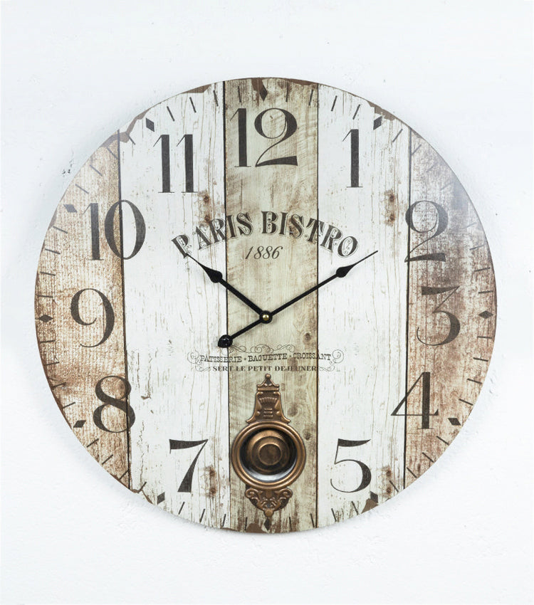 Orologio con dondolo in legno