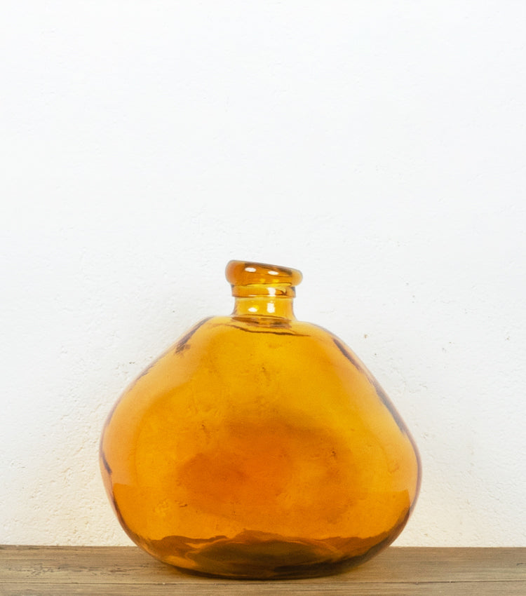 Ampolla in vetro colorato arancione, martellato e deformato